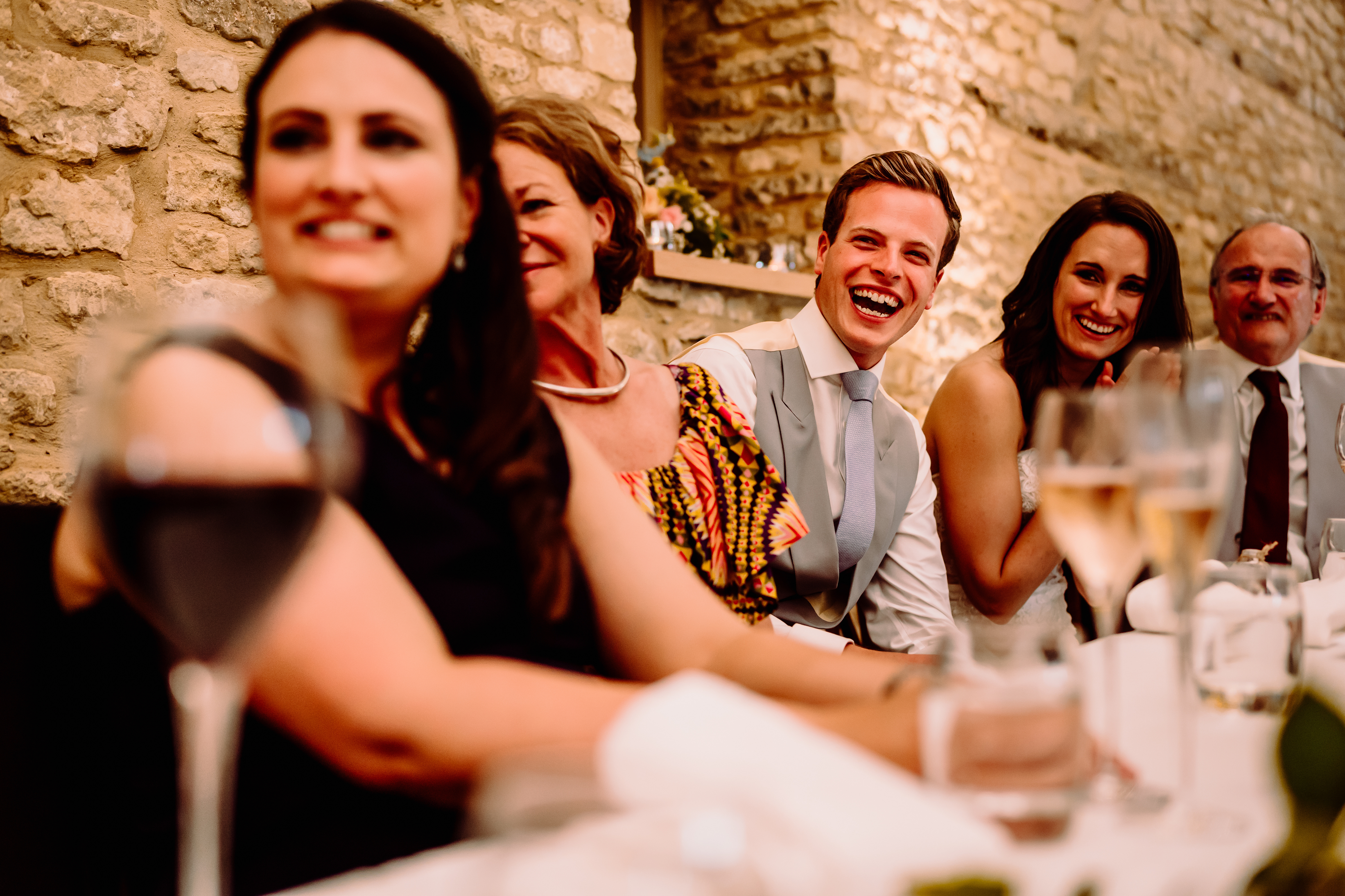 a groom laughing