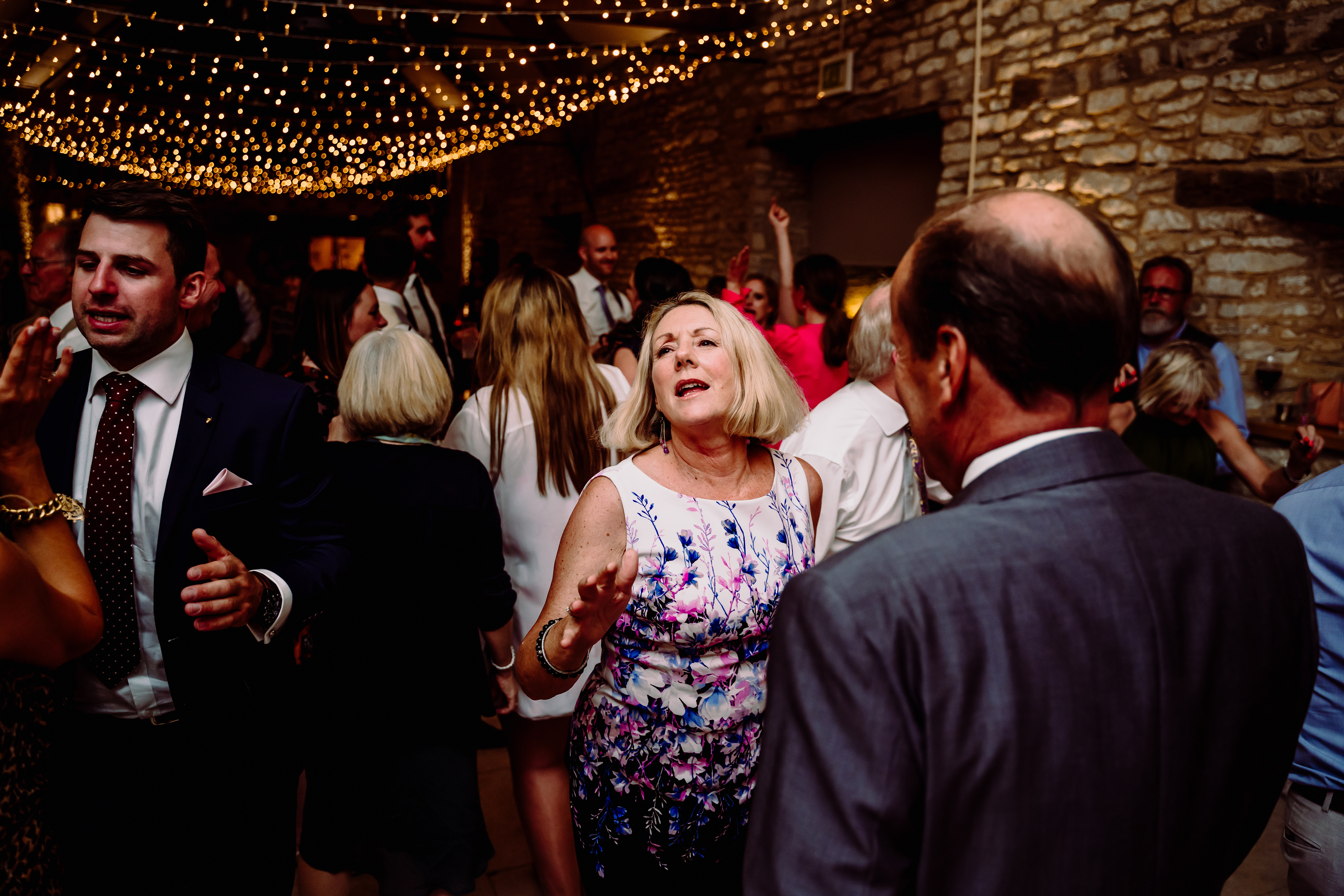 a lady singing and dancing