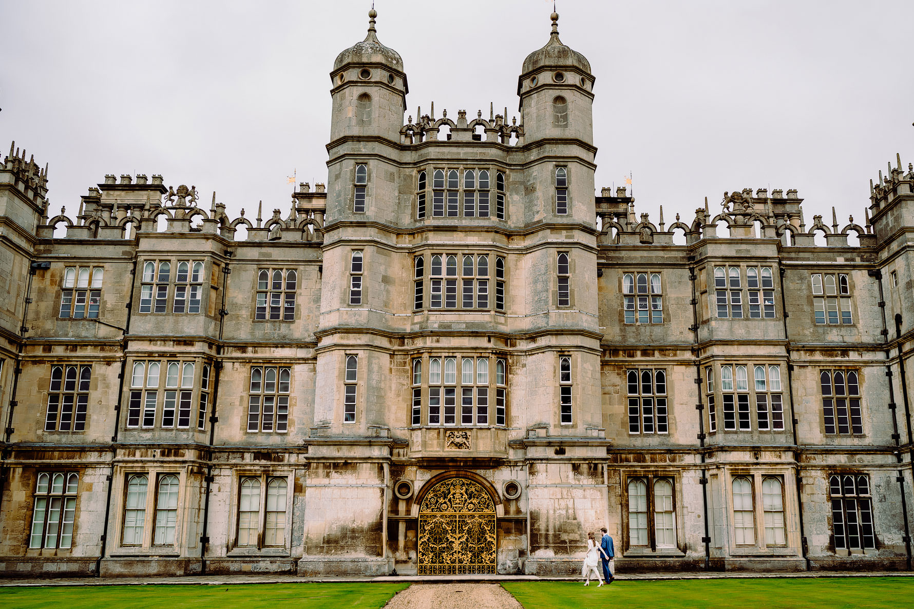 bride and groom at Burghley house
