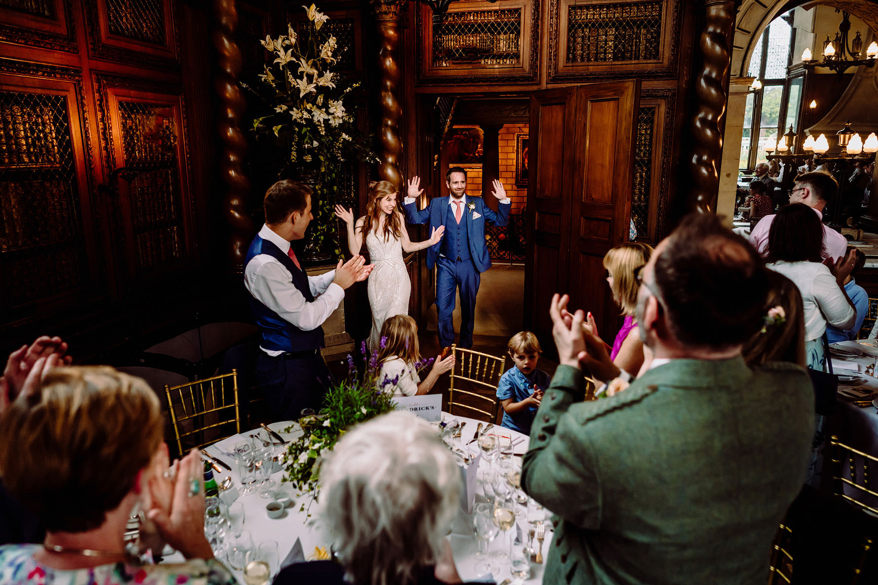 the bride and groom enter to applause