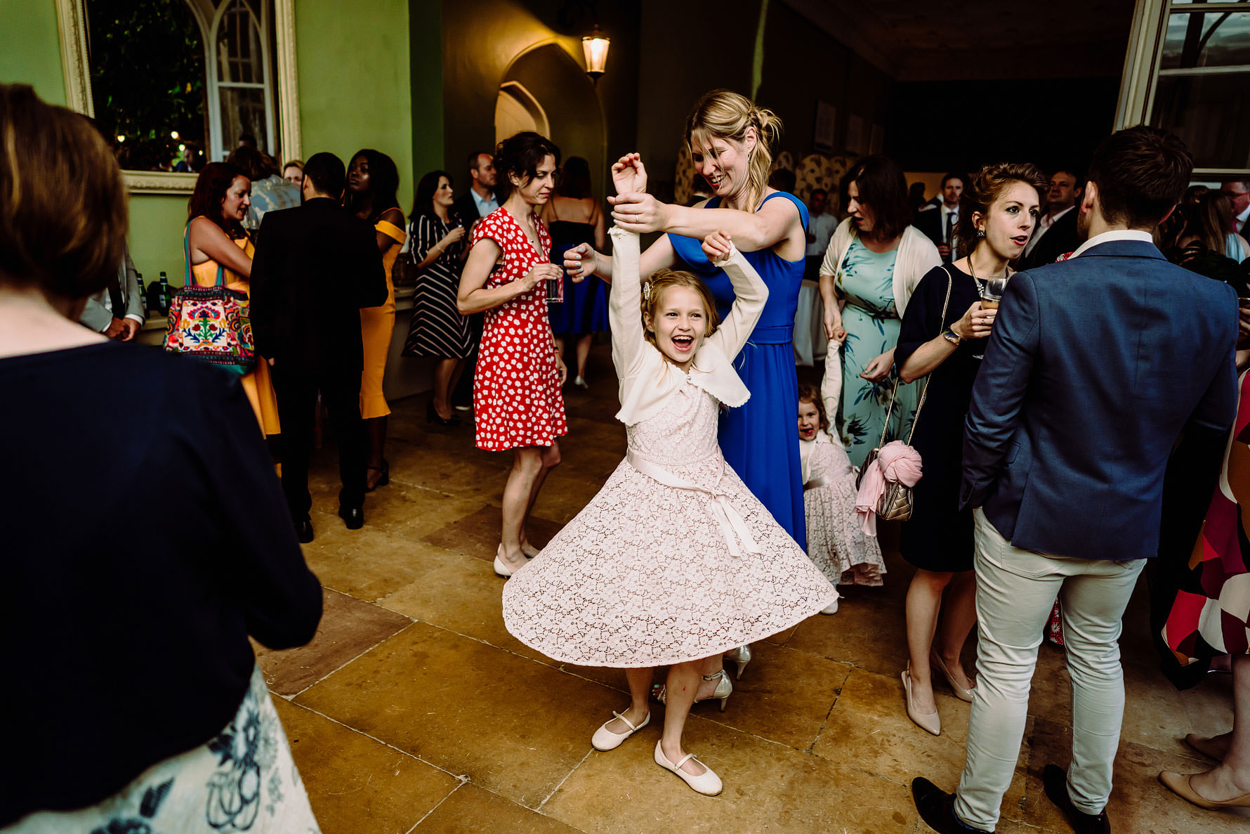 a girl twirls her dress