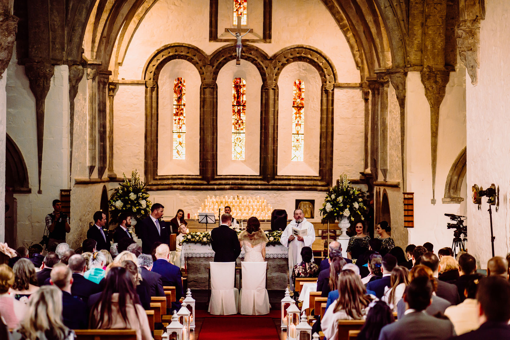 a bride and groom during their ceremony