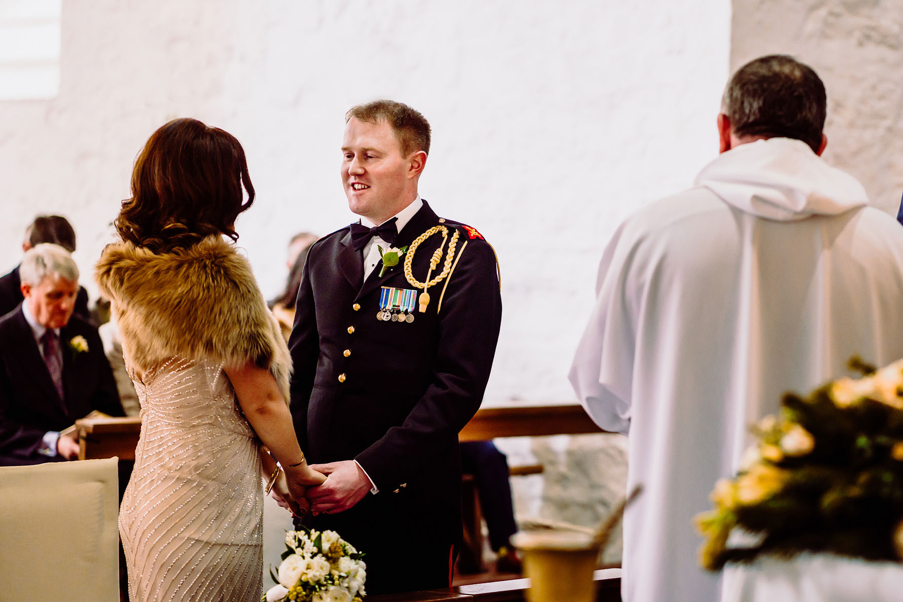 a groom dressed in military uniform