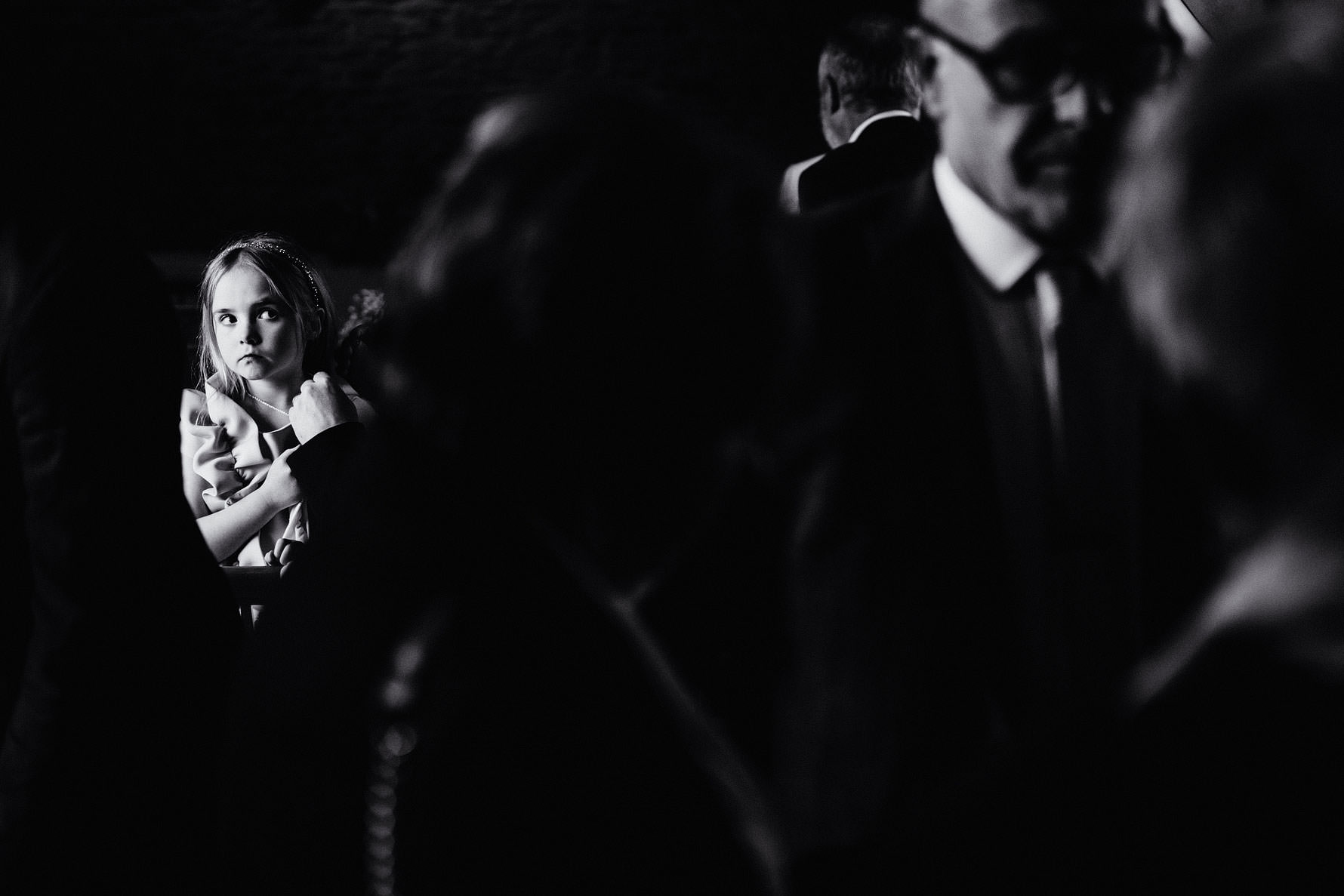 a little girl at a wedding