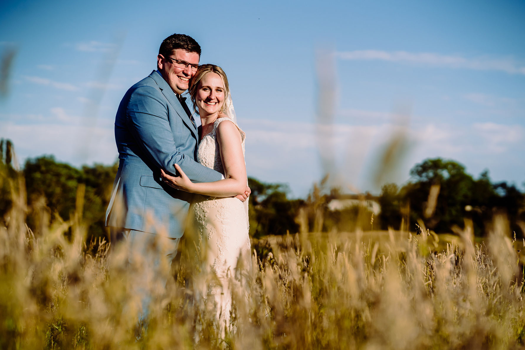 a wedding photo in a field