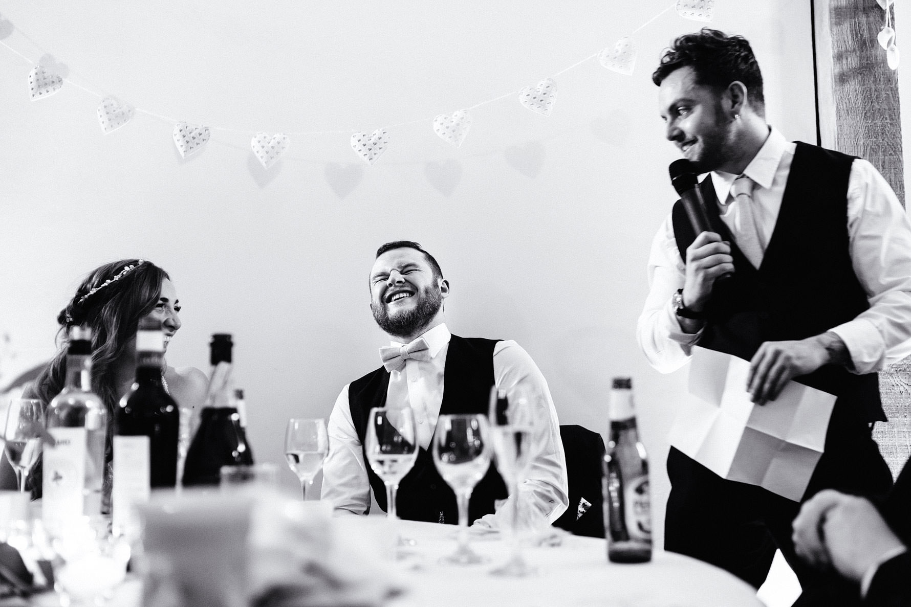 bestman has fun during his speech