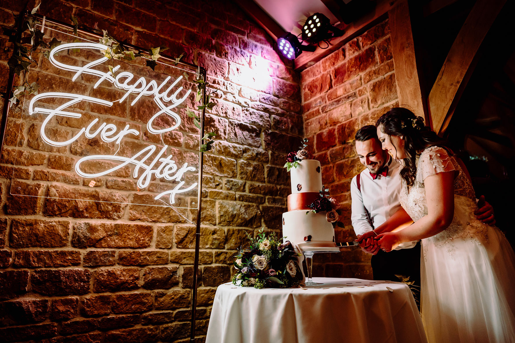 cake cutting at a wedding at dodford manor