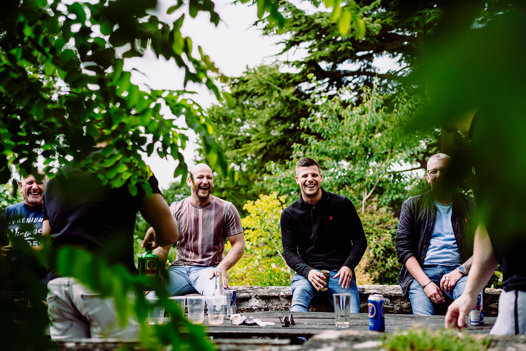 a groom and his friends share a joke