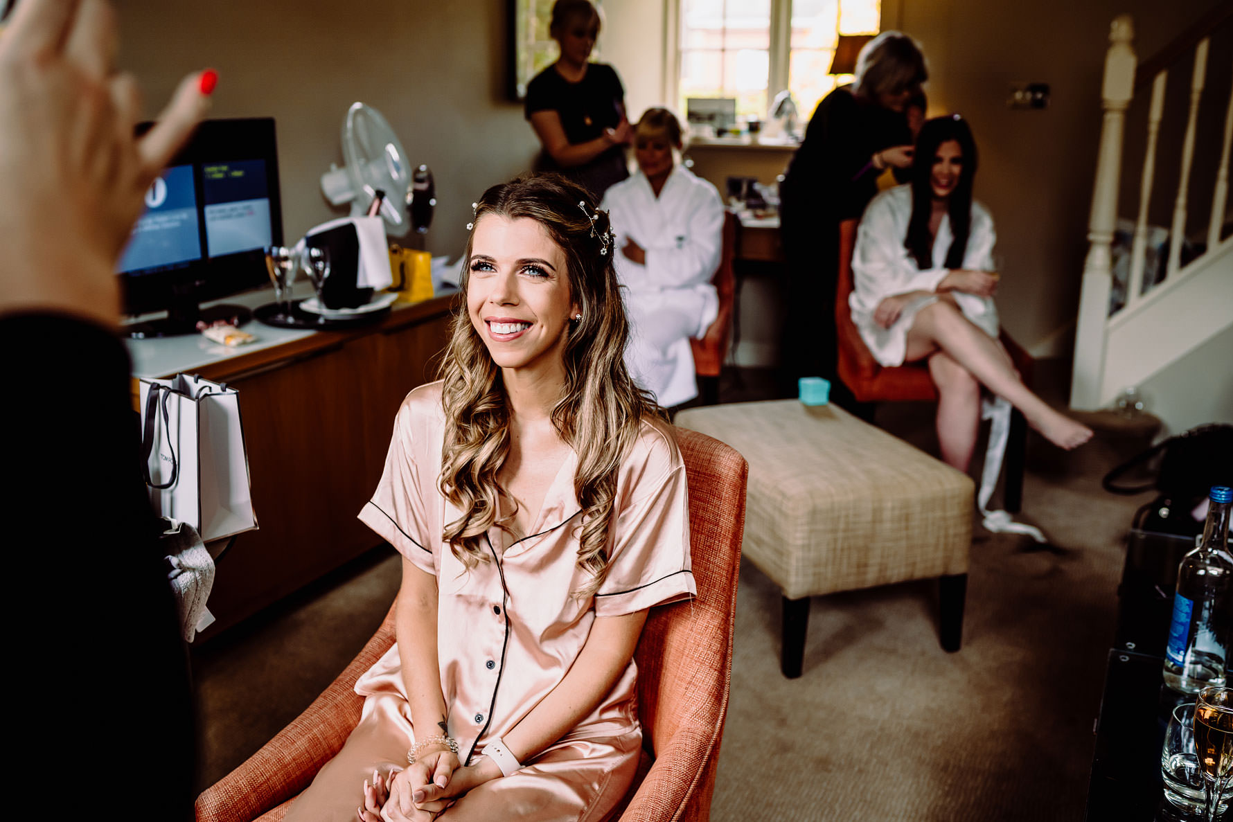 a bridesmaid laughs