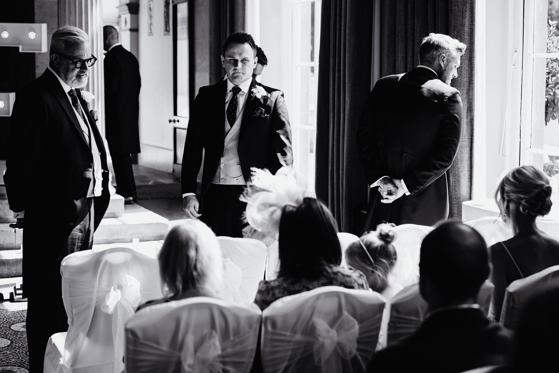 the groom waits for his bride