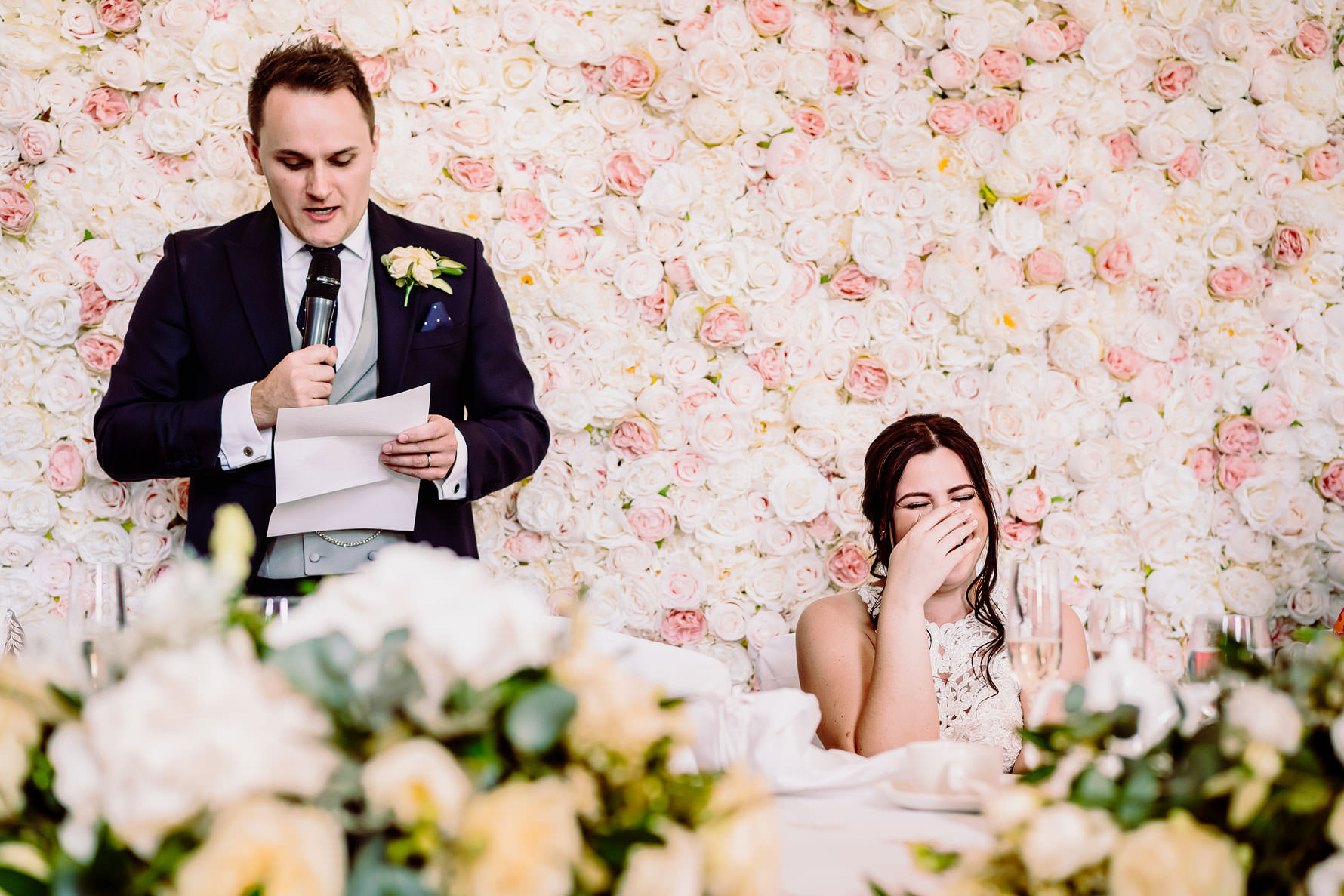 a bride gets embarrassed during the grooms speech