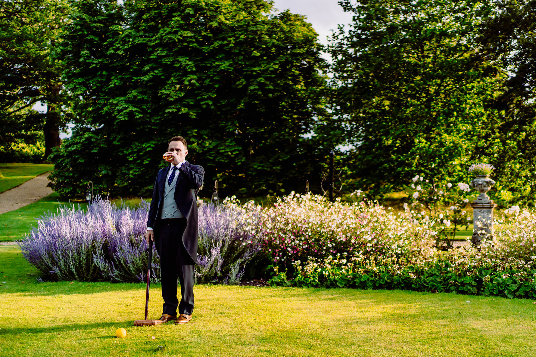 a groom drinking