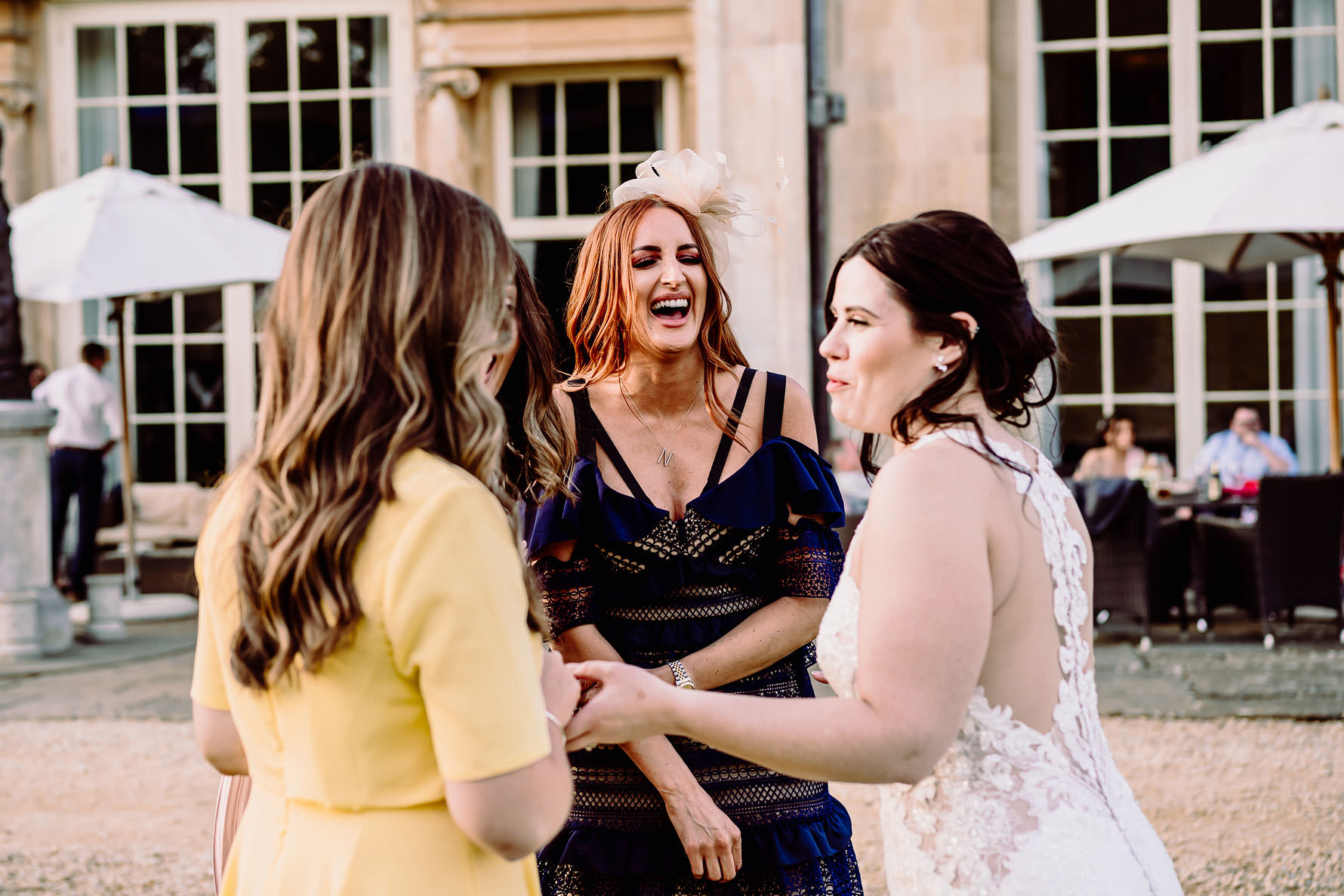 a lady with red hair laughing