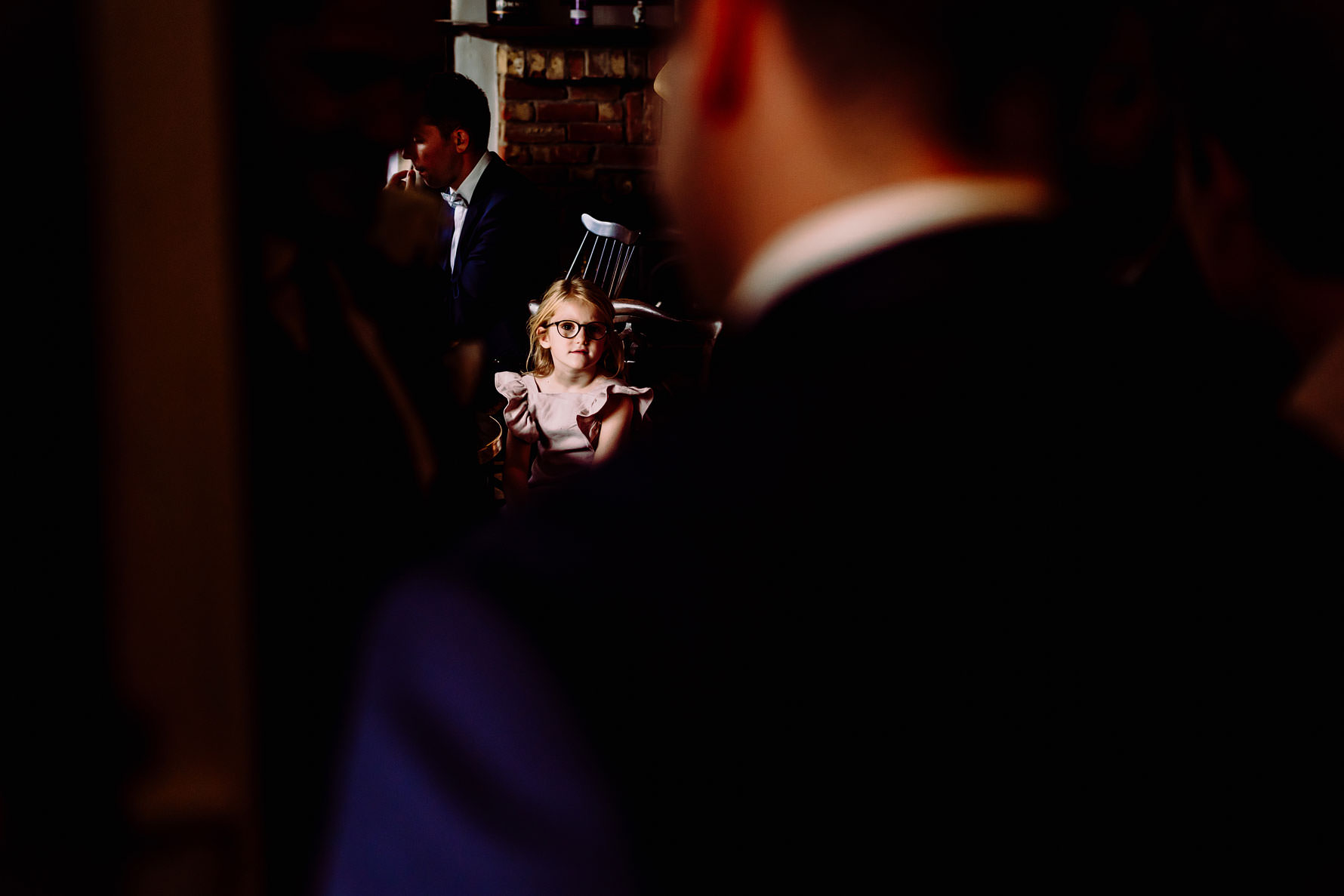 a little girl at a wedding