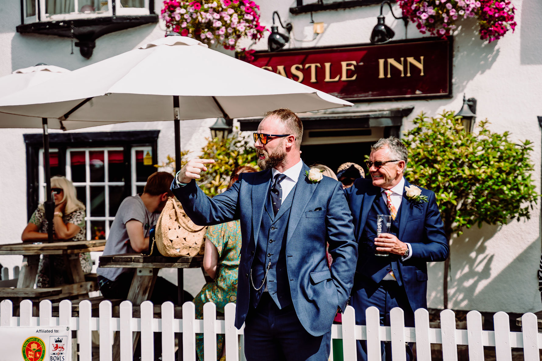 a bestman directs traffic