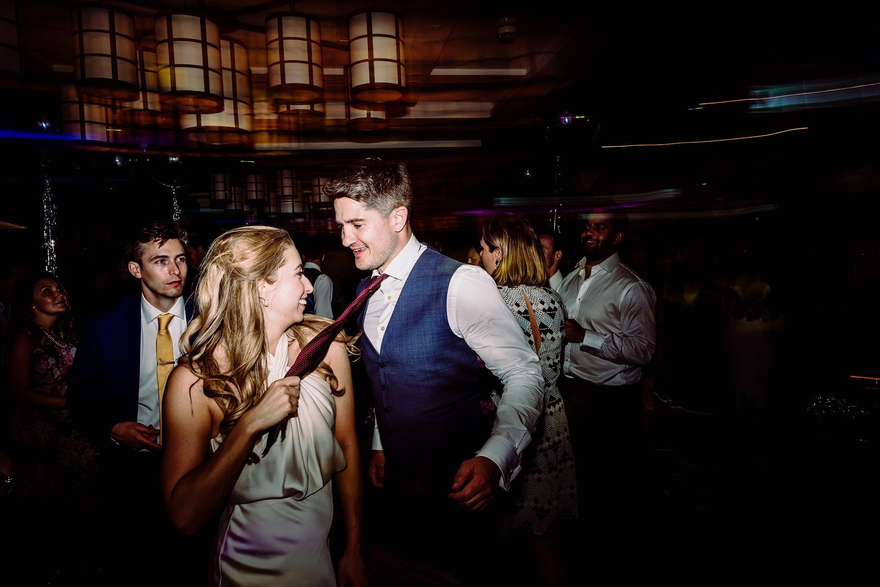 the bride and groom dancing