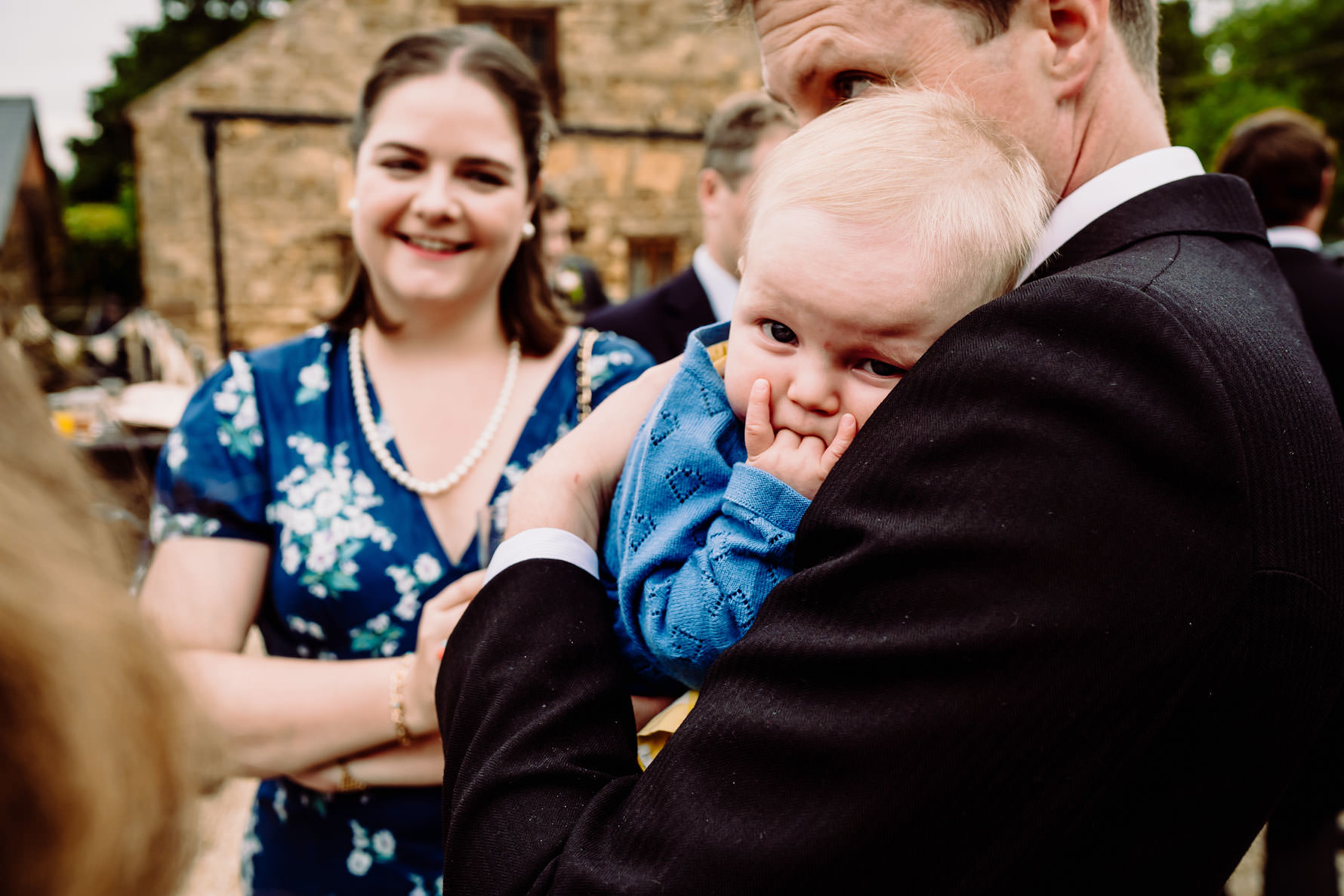 a funny photo a a young wedding guest